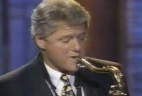 Clinton, blowing the pipes of peace